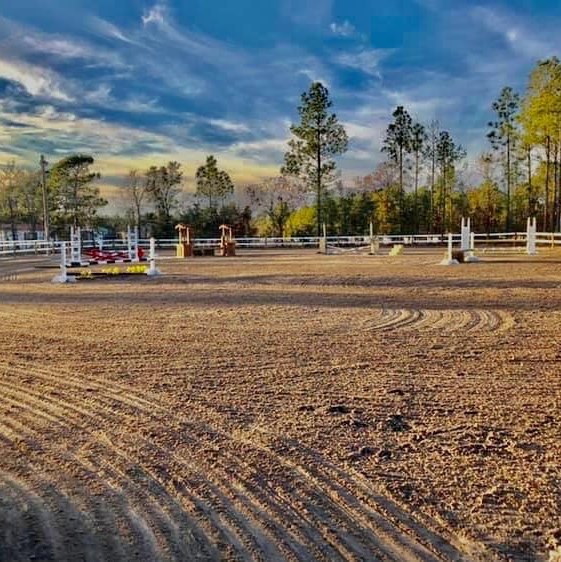 Arena with jumps at sunset